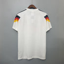 camisa-camiseta-alemanha-selecao-selecao-alema-alema-adidas-versao-versao-torcedor-masculina-1990-home-casa-i-principal-1-branca-branco-amarela-amarelo-preta-preto-vermelha-vermelho-r_95470c6a-ec8c-4159-9c69-c8feb01062e6