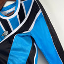 camisa-camiseta-manga-longa-gremio-gremio-banrisul-umbro-versao-versao-torcedor-masculina-23-24-home-casa-i-principal-1-azul-preto-preta-branca-branco_5