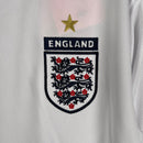 camisa-camiseta-manga-longa-inglaterra-umbro-selecao-selecao-inglesa-versao-versao-torcedor-masculina-2006-home-casa-i-principal-1-david-beckham-branco-branca-azul-vermelho-vermelha-r_d000e985-3be1-4eb7-b56f-8b458e924ad5