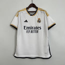 camisa-camiseta-real-madrid-adidas-emirates-fly-better-versao-versao-torcedor-masculina-23-24-home-casa-principal-i-branca-branco-amarela-amarelo_1