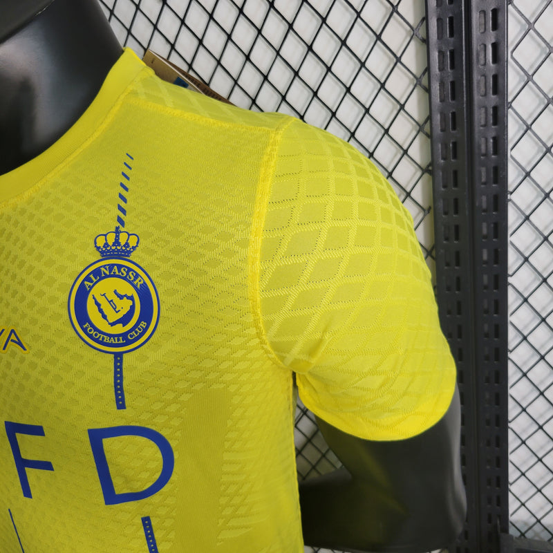 camisa-camiseta-al-nassr-kafd-nike-versao-versao-jogador-masculina-23-24-home-casa-i-principal-1-cr7-cristiano-ronaldo-talisca-anderson-amarela-amarelo-azul_11