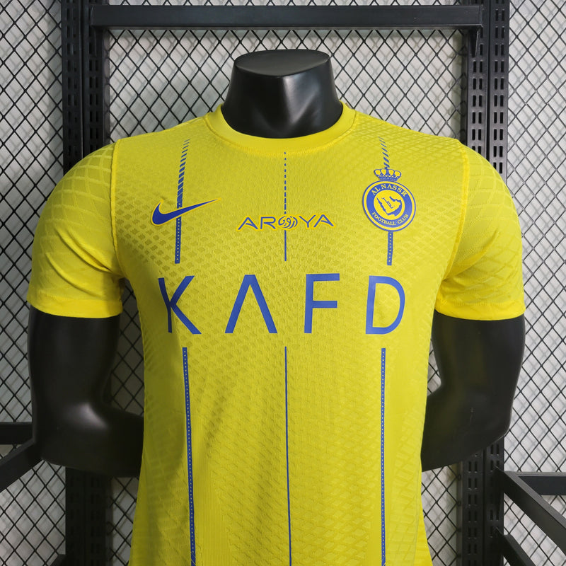 camisa-camiseta-al-nassr-kafd-nike-versao-versao-jogador-masculina-23-24-home-casa-i-principal-1-cr7-cristiano-ronaldo-talisca-anderson-amarela-amarelo-azul_3