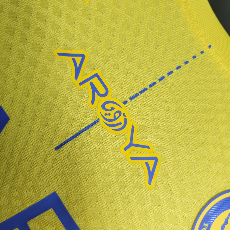 camisa-camiseta-al-nassr-kafd-nike-versao-versao-jogador-masculina-23-24-home-casa-i-principal-1-cr7-cristiano-ronaldo-talisca-anderson-amarela-amarelo-azul_5