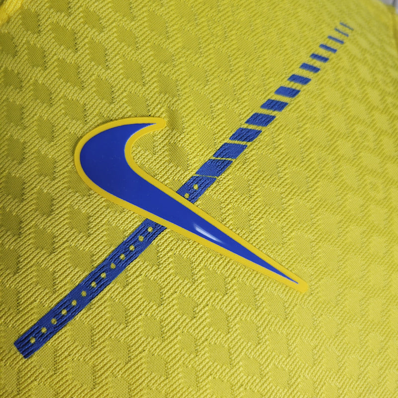camisa-camiseta-al-nassr-kafd-nike-versao-versao-jogador-masculina-23-24-home-casa-i-principal-1-cr7-cristiano-ronaldo-talisca-anderson-amarela-amarelo-azul_7