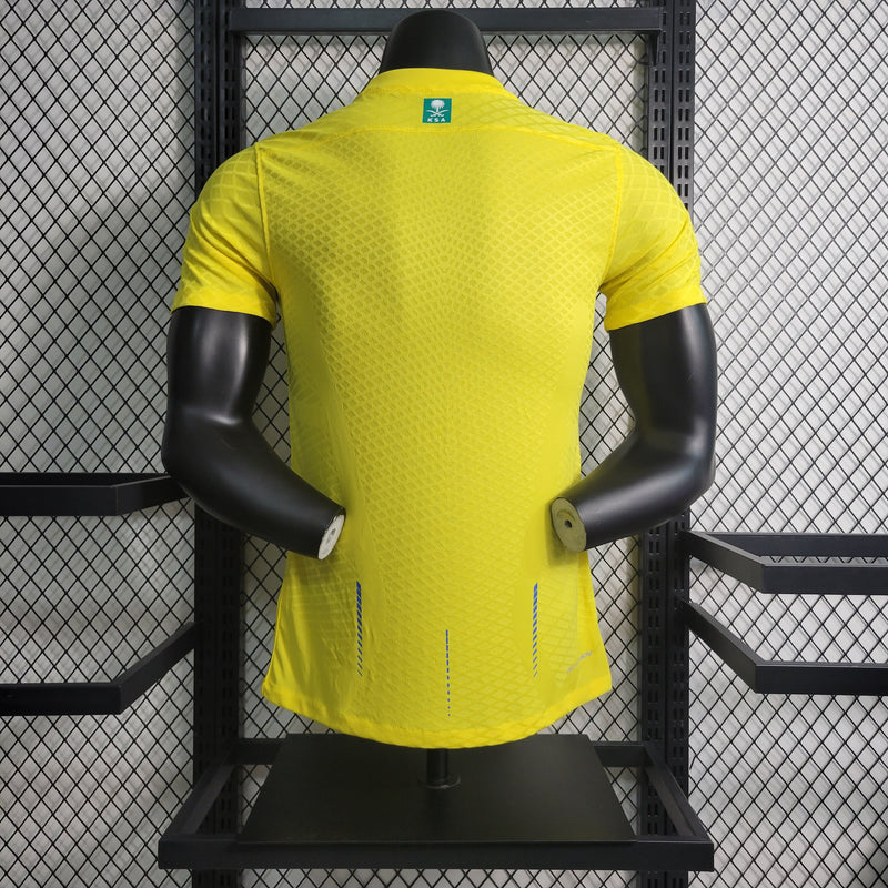 camisa-camiseta-al-nassr-kafd-nike-versao-versao-jogador-masculina-23-24-home-casa-i-principal-1-cr7-cristiano-ronaldo-talisca-anderson-amarela-amarelo-azul_8