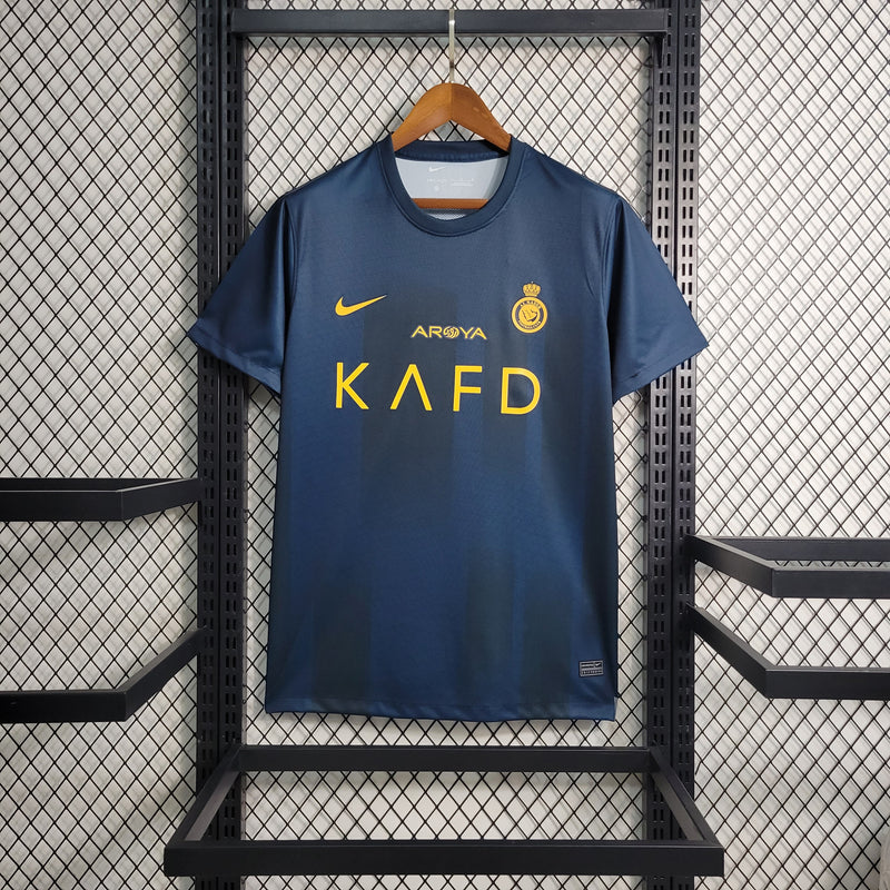 camisa-camiseta-al-nassr-kafd-nike-versao-versao-torcedor-masculina-23-24-away-fora-ii-secundaria-2-cr7-cristiano-ronaldo-talisca-anderson-amarela-amarelo-azul_1
