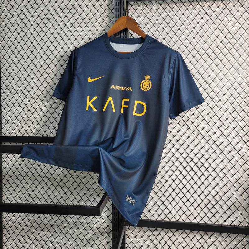 camisa-camiseta-al-nassr-kafd-nike-versao-versao-torcedor-masculina-23-24-away-fora-ii-secundaria-2-cr7-cristiano-ronaldo-talisca-anderson-amarela-amarelo-azul_8