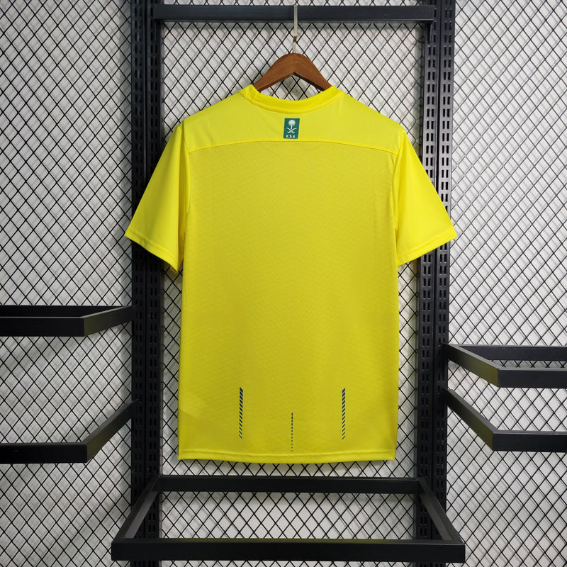 camisa-camiseta-al-nassr-kafd-nike-versao-versao-torcedor-masculina-23-24-home-casa-i-principal-1-cr7-cristiano-ronaldo-talisca-anderson-amarela-amarelo-azul_6