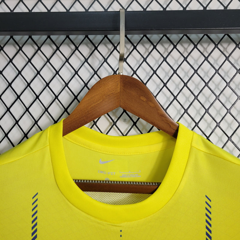 camisa-camiseta-al-nassr-kafd-nike-versao-versao-torcedor-masculina-23-24-home-casa-i-principal-1-cr7-cristiano-ronaldo-talisca-anderson-amarela-amarelo-azul_7