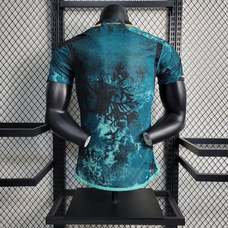 camisa-camiseta-alemanha-selecao-selecao-alema-alema-adidas-versao-versao-jogador-masculina-23-24-secundaria-ii-2-away-fora-verde-azul-preta-preto-amarela-amarelo_1_e4eb955a-8d38-424d-a521-350893185ccf