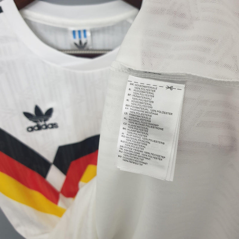 camisa-camiseta-alemanha-selecao-selecao-alema-alema-adidas-versao-versao-torcedor-masculina-1990-home-casa-i-principal-1-branca-branco-amarela-amarelo-preta-preto-vermelha-vermelho-r_ea55031c-ccca-45f2-bffb-874e21fc14b9