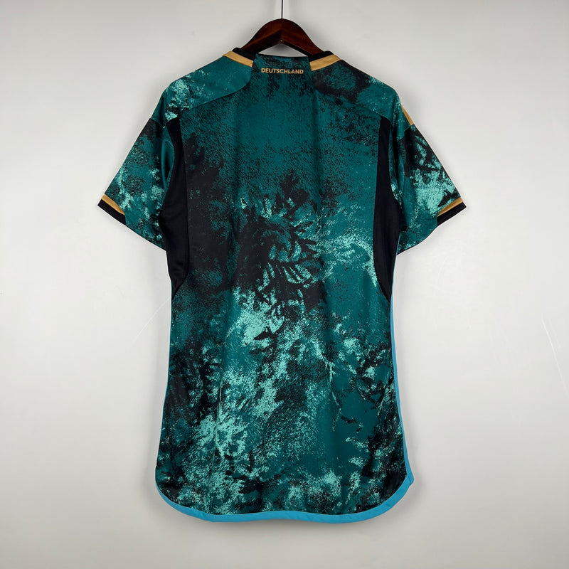 camisa-camiseta-alemanha-selecao-selecao-alema-alema-adidas-versao-versao-torcedor-masculina-23-24-secundaria-ii-2-away-fora-verde-azul-preta-preto-amarela-amarelo_6