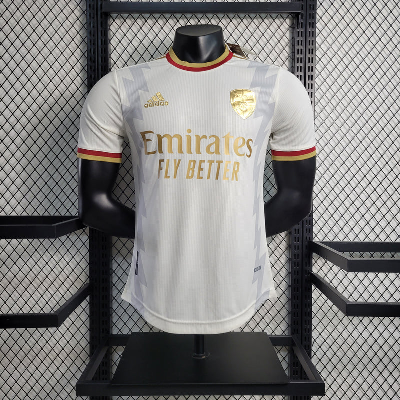 camisa-camiseta-arsenal-adidas-fly-better-emirates-versao-versao-jogador-masculina-23-24-edicao-edicao-especial-branca-branco-vermelho-vermelha-dourada-dourado-ouro_1_3e563698-9ed1-4266-9f97-49c77b460279