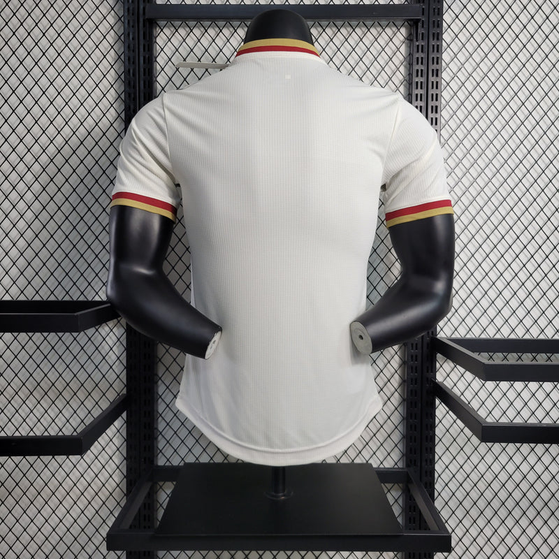 camisa-camiseta-arsenal-adidas-fly-better-emirates-versao-versao-jogador-masculina-23-24-edicao-edicao-especial-branca-branco-vermelho-vermelha-dourada-dourado-ouro_1