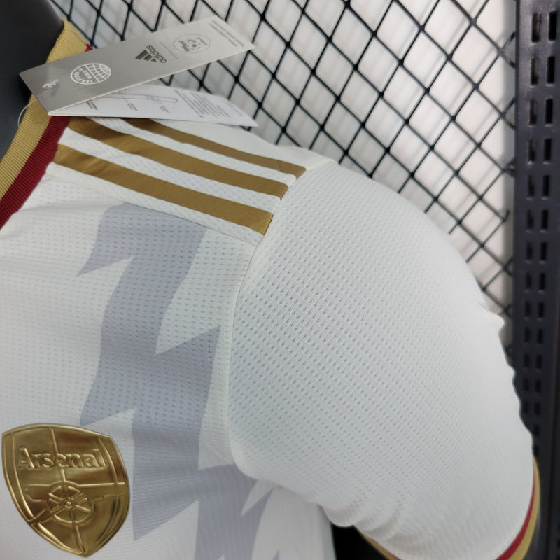 camisa-camiseta-arsenal-adidas-fly-better-emirates-versao-versao-jogador-masculina-23-24-edicao-edicao-especial-branca-branco-vermelho-vermelha-dourada-dourado-ouro_2