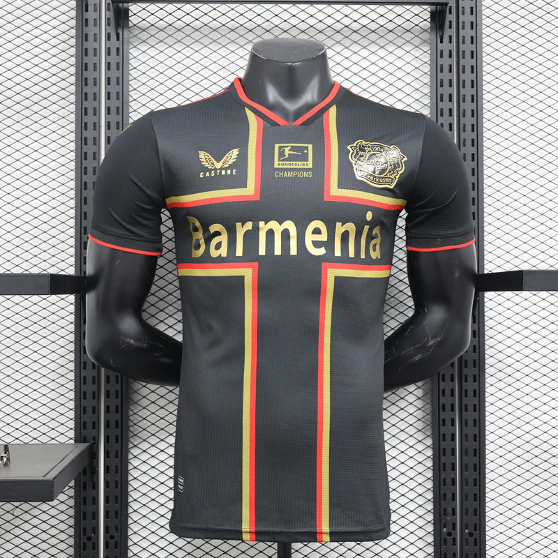 camisa-camiseta-bayer-leverkusen-castore-barmenia-versao-versao-jogador-masculina-24-25-edicao-edicao-especial-champions-preta-preto-dourada-dourado_1