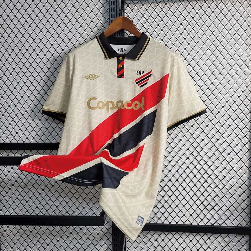 camisa-camiseta-cap-athletico-paranaense-umbro-copacol-versao-versao-torcedor-masculina-23-24-edicao-edicao-especial-dourado-dourada-vermelha-preta-vermelho-preto-bege_2