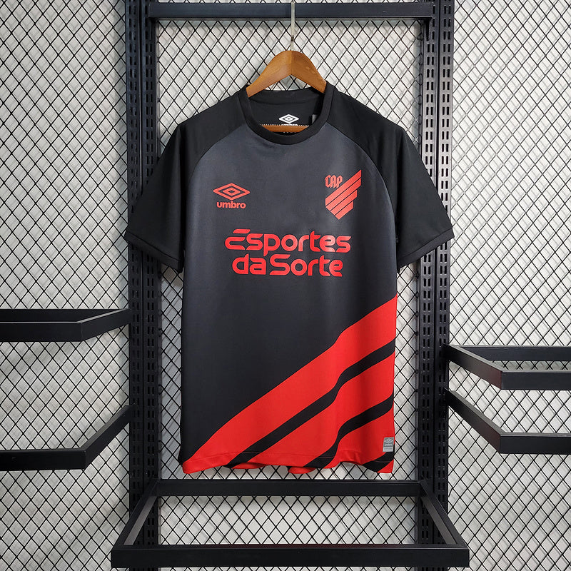 camisa-camiseta-cap-athletico-paranaense-umbro-esportes-da-sorte-versao-versao-torcedor-masculina-23-24-away-fora-ii-secundaria-2-vermelha-preta-vermelho-preto_1