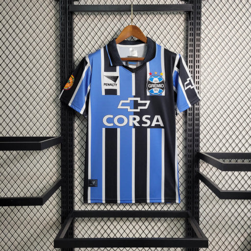 camisa-camiseta-gremio-gremio-corsa-penalty-versao-versao-torcedor-masculina-1998-home-casa-i-principal-1-azul-preto-preta-branca-branco_1