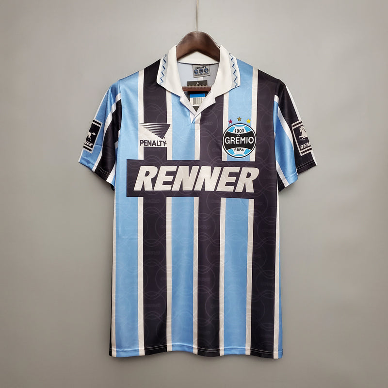 camisa-camiseta-gremio-gremio-renner-penalty-versao-versao-torcedor-masculina-1995-home-casa-i-principal-1-azul-preto-preta-branca-branco_1