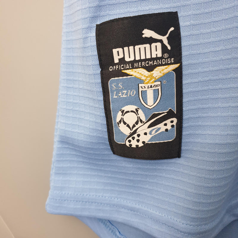 camisa-camiseta-lazio-puma-cirio-versao-versao-torcedor-masculina-99-00-home-casa-i-1-principal-azul-branca-branco-preta-preto-retro-retro_2