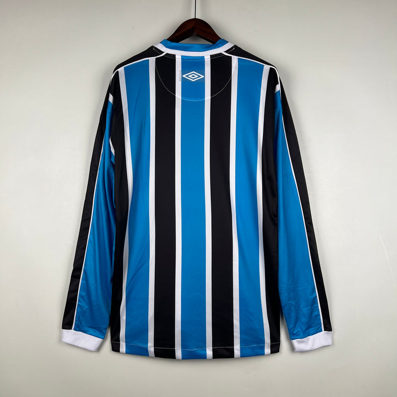 camisa-camiseta-manga-longa-gremio-gremio-banrisul-umbro-versao-versao-torcedor-masculina-23-24-home-casa-i-principal-1-azul-preto-preta-branca-branco_2