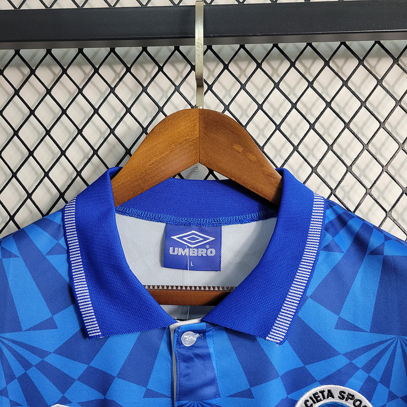 camisa-camiseta-napoli-umbro-voiello-versao-versao-torcedor-masculina-91-93-home-casa-i-1-principal-branca-branco-azul-retro-retro_4