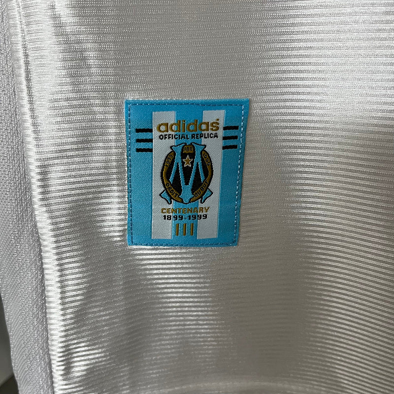 camisa-camiseta-olympique-marseille-adidas-ericsson-versao-versao-torcedor-masculina-98-99-home-casa-i-principal-1-azul-branca-branco-retro-retro_10