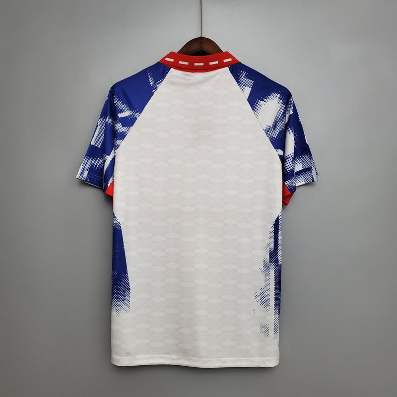 camisa-camiseta-paris-saint-germain-psg-nike-commodore-tourtel-versao-versao-torcedor-masculina-93-94-away-fora-ii-secundaria-2-branca-branco-azul-vermelha-vermelho-retro-retro
