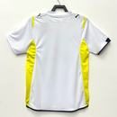 camisa-camiseta-tottenham-spurs-puma-mansion-com-casino-_-poker-m-versao-torcedor-masculina-09-10-home-casa-i-1-principal-branca-branco-azul-amarela-amarelo-retro