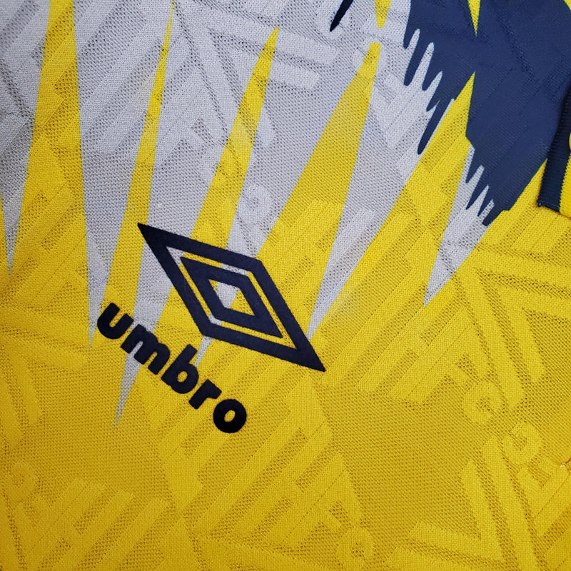 camisa-camiseta-tottenham-spurs-umbro-holsten-versao-torcedor-masculina-92-94-away-fora-secundaria-ii-2-amarela-amarelo-azul-retro_6